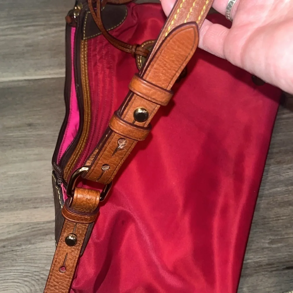 Dooney & Bourke boho sak purse in red with hot pink interior 1975 tag